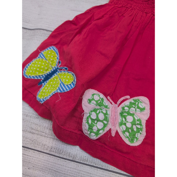 9/10 Mini Boden Smocked Butterfly Skirt - Picture 2 of 6
